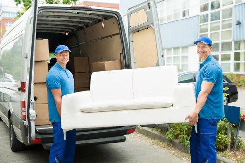 Man and van loading furniture in Kentishtown street
