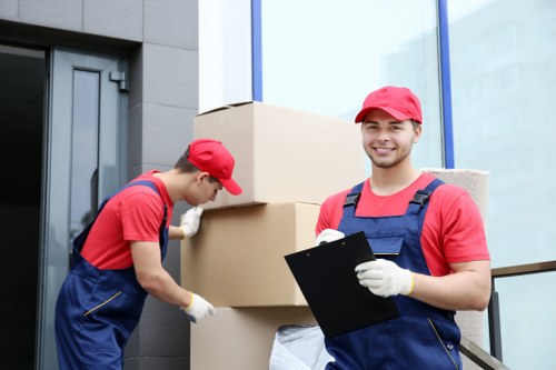 Team coordinating an office move in Kentishtown with desks and equipment prepared