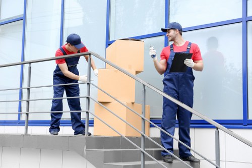 Staff assessing risks and securing items before loading