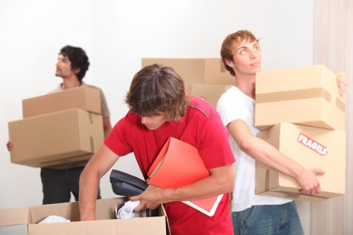 Local movers in Kentishtown wrapping fragile belongings for safe transport