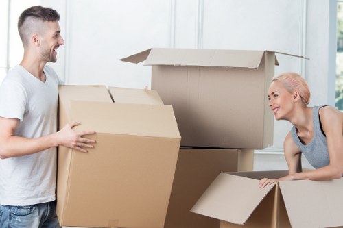 Worker maintaining safe practices during a house move