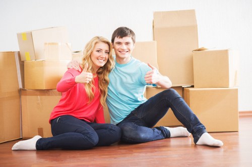 Careful lifting and loading during a house move in North London