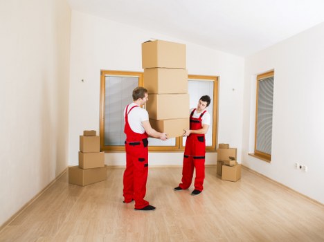 Packed boxes and furniture ready for local home removal
